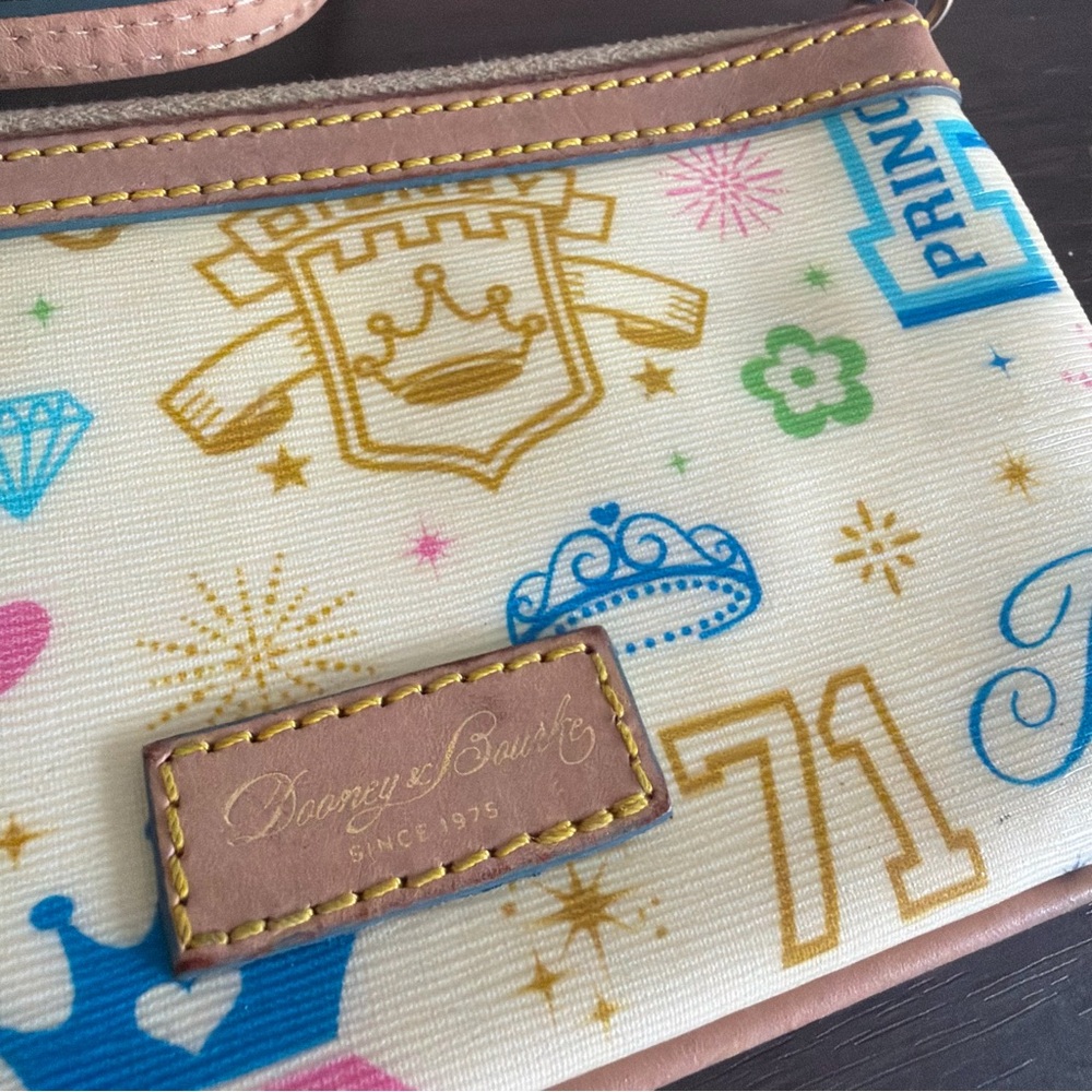 Dooney & Bourke Disney Princess WDW 71 Wristlet Cream Multi - Picture 2 of 4
